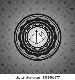 pyramids icon inside realistic dark emblem