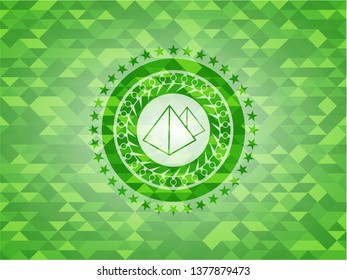 pyramids icon inside realistic green mosaic emblem