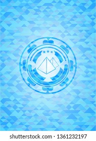pyramids icon inside realistic sky blue mosaic emblem