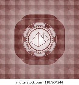 pyramids icon inside red emblem or badge with geometric pattern background. Seamless.