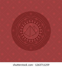 pyramids icon inside red emblem. Vintage.