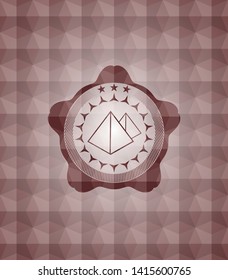 pyramids icon inside red geometric pattern emblem. Seamless.