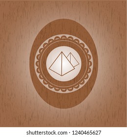 pyramids icon inside retro style wooden emblem