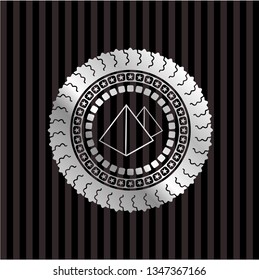 pyramids icon inside silver emblem