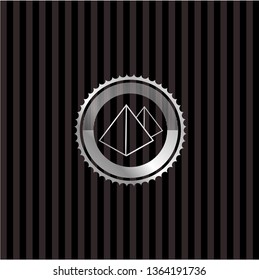 pyramids icon inside silver emblem or badge
