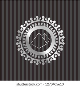 pyramids icon inside silvery badge