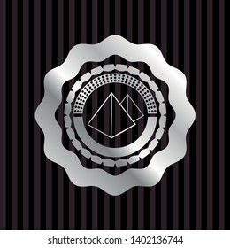 pyramids icon inside silvery badge or emblem