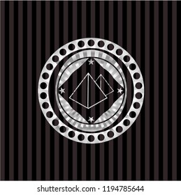 pyramids icon inside silvery emblem
