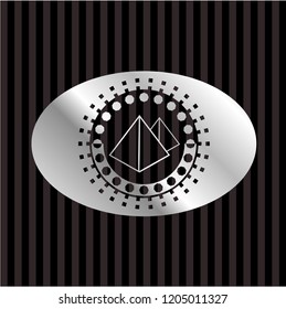 pyramids icon inside silvery emblem