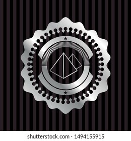pyramids icon inside silvery emblem
