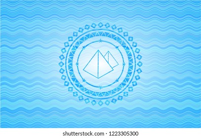 pyramids icon inside water concept style emblem.