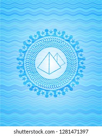 pyramids icon inside water representation style emblem.
