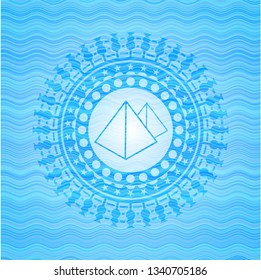 pyramids icon inside water representation badge.