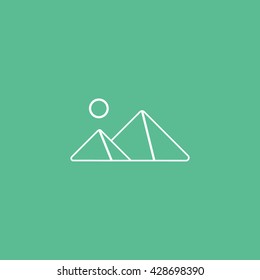 Pyramids Icon On Green Background