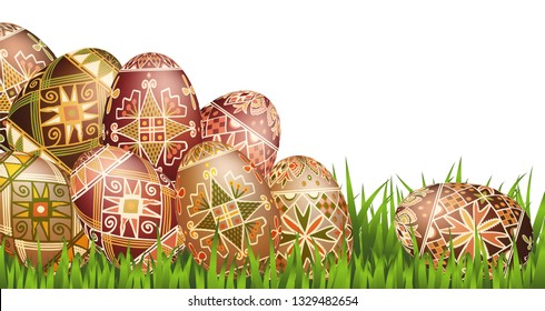 Pysanky easter eggs in grass isolated on white. Traditional ukrainian easter eggs.