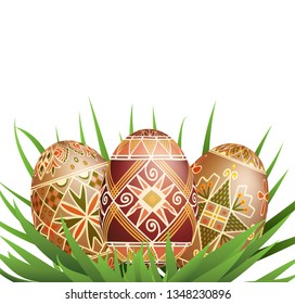 Pysanky easter eggs in grass isolated on white. Traditional ukrainian easter eggs.