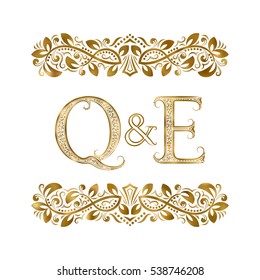 Q and E vintage initials logo symbol. The letters are surrounded by ornamental elements. Wedding or business partners monogram in royal style.