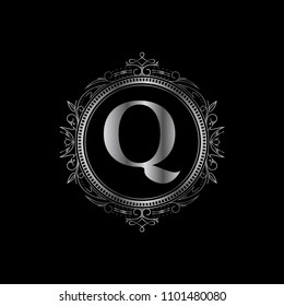 Q initial letter logo with luxury ornament. Silver color edition