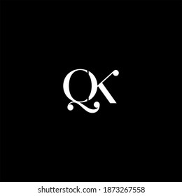 Q K letter logo creative design on black color background. qk monogram