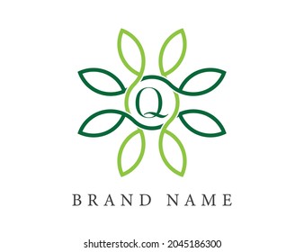 Q Letter with Flower logo. Vector logo template