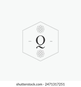 Q letter logo with a creative floral concept for company business beauty real estate premium vector