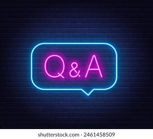 Q and A Neon Sign in speech bubble on brick wall background..