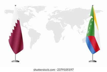  Qatar and Comoros flags for official meeting against background of world map.