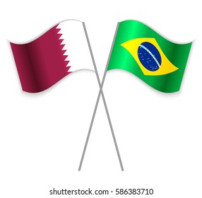 Qatari and Brazilian crossed flags. Qatar combined with Brazil isolated on white. Language learning, international business or travel concept.