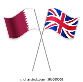 Qatari and British crossed flags. Qatar combined with United Kingdom isolated on white. Language learning, international business or travel concept.