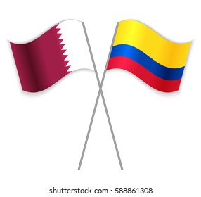 Qatari and Colombian crossed flags. Qatar combined with Colombia isolated on white. Language learning, international business or travel concept.