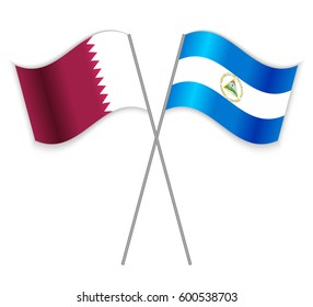 Qatari and Nicaraguan crossed flags. Qatar combined with Nicaragua isolated on white. Language learning, international business or travel concept.