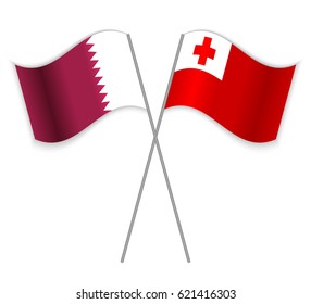 Qatari and Tongan crossed flags. Qatar combined with Tonga isolated on white. Language learning, international business or travel concept.