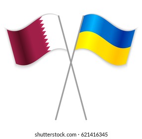 Qatari and Ukrainian crossed flags. Qatar combined with Ukraine isolated on white. Language learning, international business or travel concept.