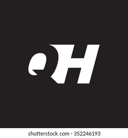 QH negative space letter logo black background