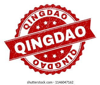 QINGDAO seal print with corroded texture. Rubber seal imitation has round medallion form and contains ribbon. Red vector rubber print of QINGDAO title with corroded texture.