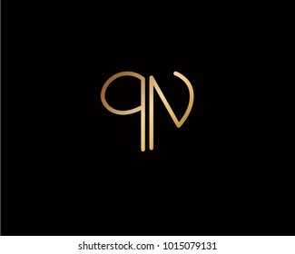 QN initial heart shape gold colored logo