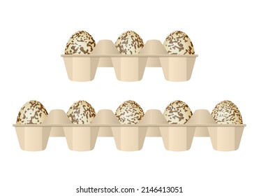 Quail eggs in carton box on a white background.