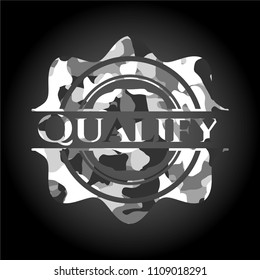 Qualify on grey camouflaged texture