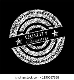 Quality Guarantee chalkboard emblem on black board