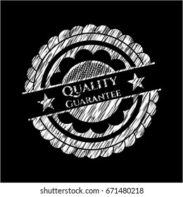 Quality Guarantee chalkboard emblem on black board