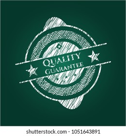 Quality Guarantee chalkboard emblem written on a blackboard