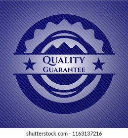 Quality Guarantee emblem with denim high quality background