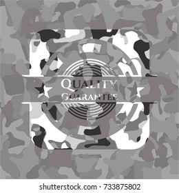 Quality Guarantee grey camouflaged emblem