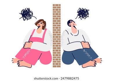 Quarrel between man and woman who sense obstacles in relationship, sitting on opposite sides of wall. Conflict married couple is caused by chaos in heads and accumulated personal grievances