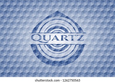Quartz blue badge with geometric pattern.
