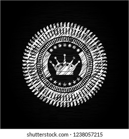 queen crown icon drawn on blackboard