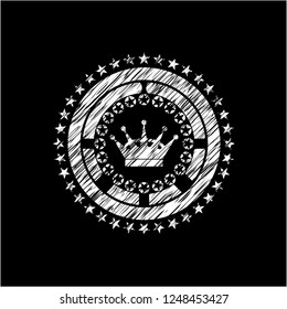 queen crown icon drawn on a blackboard