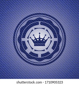 queen crown icon inside badge with jean texture. 
