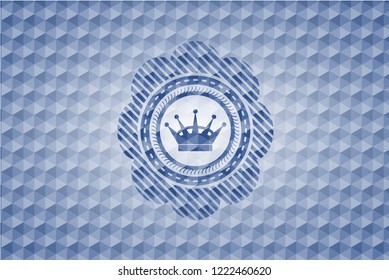 queen crown icon inside blue polygonal emblem.