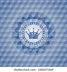 queen crown icon inside blue emblem or badge with abstract geometric polygonal pattern background.